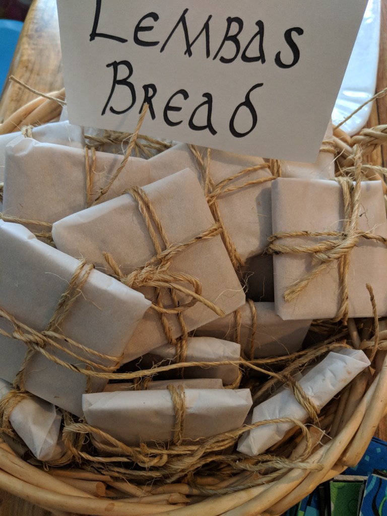 Wrapped parcels with a sign that says "Lembas Bread" in Hobbit-ish writing.